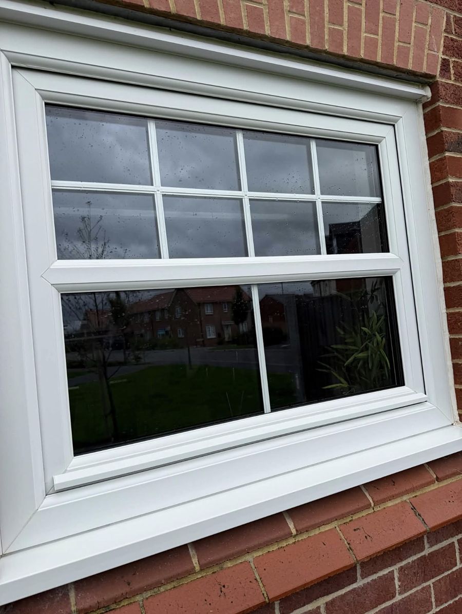 The same window bright white after cleaning